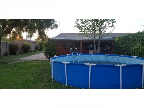 OPORTUNIDAD!!HERMOSA CASA A ESTRENAR EN BARRIO SEMI CERRADO, C/ PISCINA,PARQUE Y QUINCHO LOTE 420 m2